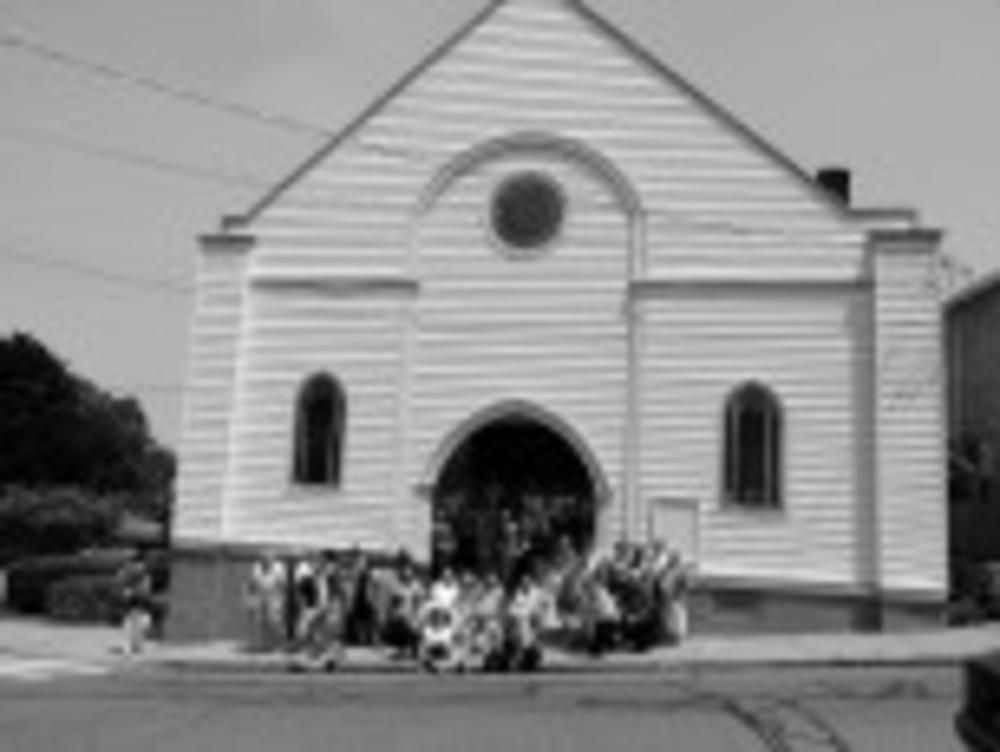 Synagogue members gather at Congregation Beth Jacob in late June 2013.